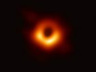 The Event Horizon Telescope (EHT) — a planet-scale array of eight ground-based radio telescopes forged through international collaboration — was designed to capture images of a black hole. In coordinated press conferences across the globe, EHT researchers revealed that they succeeded, unveiling the first direct visual evidence of a supermassive black hole and its shadow. The shadow of a black hole seen here is the closest we can come to an image of the black hole itself, a completely dark object from which light cannot escape. The black hole’s boundary — the event horizon from which the EHT takes its name — is around 2.5 times smaller than the shadow it casts and measures just under 40 billion km across. While this may sound large, this ring is only about 40 microarcseconds across — equivalent to measuring the length of a credit card on the surface of the Moon. Although the telescopes making up the EHT are not physically connected, they are able to synchronize their recorded data with atomic clocks — hydrogen masers — which precisely time their observations. These observations were collected at a wavelength of 1.3 mm during a 2017 global campaign. Each telescope of the EHT produced enormous amounts of data – roughly 350 terabytes per day – which was stored on high-performance helium-filled hard drives. These data were flown to highly specialised supercomputers — known as correlators — at the Max Planck Institute for Radio Astronomy and MIT Haystack Observatory to be combined. They were then painstakingly converted into an image using novel computational tools developed by the collaboration.